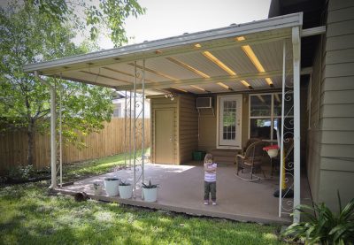 Exterior (Before) "Our back porch is covered, but air circulation through it is poor and it is infested with mosquitoes. It makes our daughter sad."