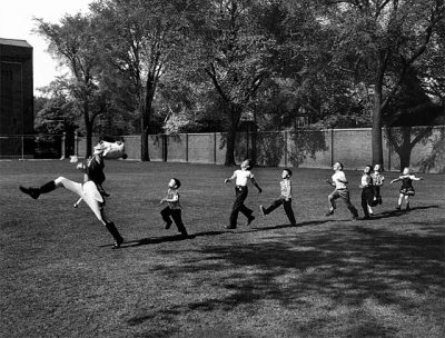 Uniformed Drum Major For University of Michigan Marching Band Practicing His High Kicking Prance - Alfred Eisenstaedt