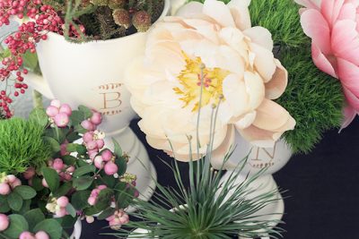 Monogrammed Trophies Filled with Flowers