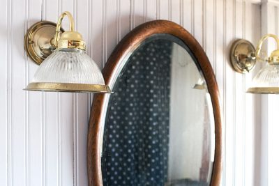 Antique Bathroom Mirror and Brass Sconces #makingitlovely