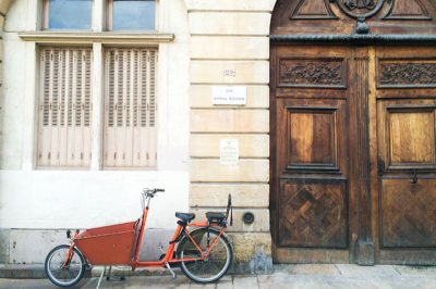 A Cute Orange Bicycle in Dijon, France