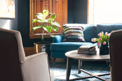 Teal Sofa, Black Walls, Blue Loloi Rug | Making it Lovely