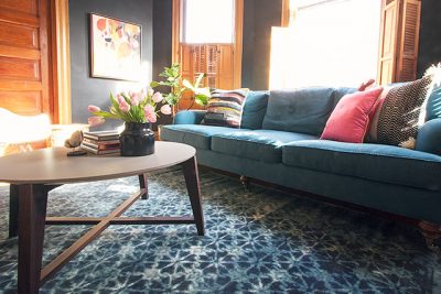 Teal Sofa, Black Walls, Blue Loloi Rug | Making it Lovely