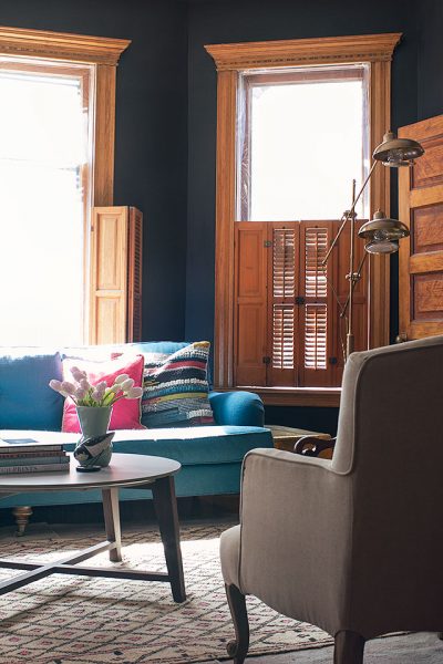Black Walls, Teal Sofa, Moroccan Rug | Making it Lovely