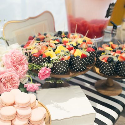 Pink Macarons, Fruit, Watermelon-Infused Water, and Mimosas