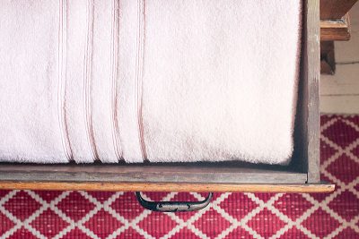 Pink Towels, Tucked Away in Bathroom Sink Drawers