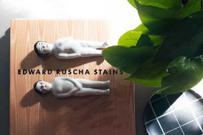 Coffee Table Books, Lil Nudies, Plant, and Plaid Plate