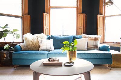 Teal Sofa with Plaid Pillows | Making it Lovely