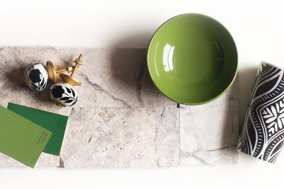 Travertine Tile with Black, White, Gold, and Vivid Green Accents