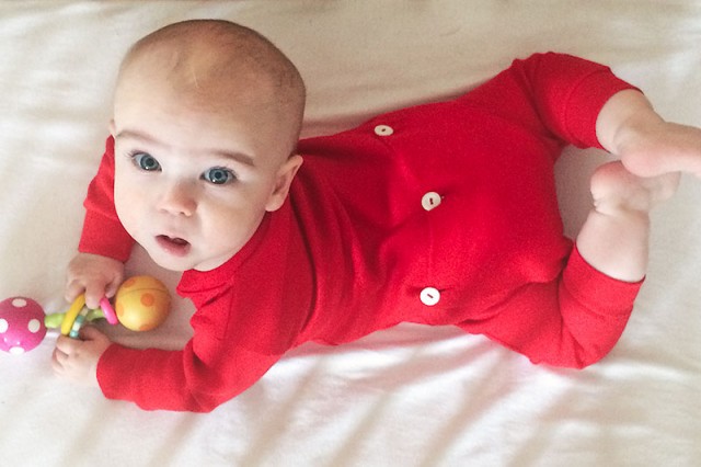 Six Month Old Baby in a Red Union Suit
