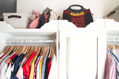 Purses Above the Closet's Hanging Storage