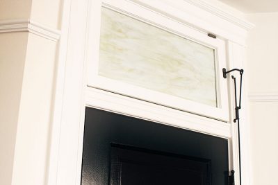 White Trim and Transom Window, Black Door