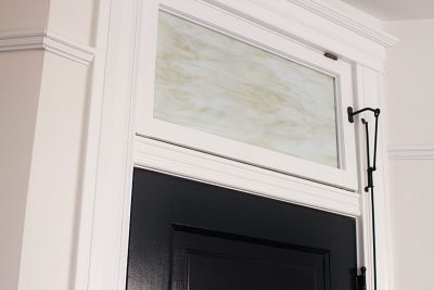 White Trim and Transom Window, Black Door