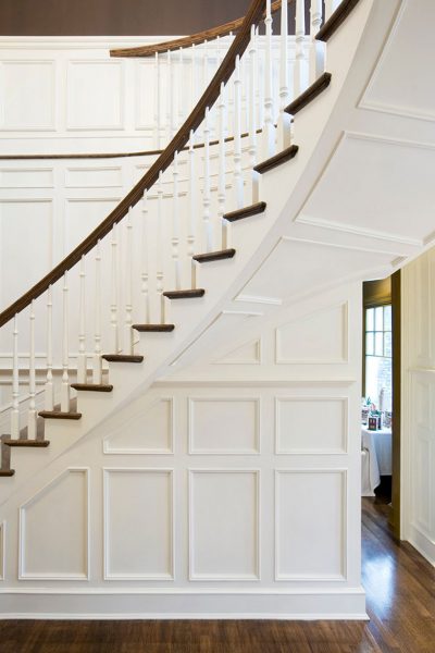 White Paneled Wooden Staircase