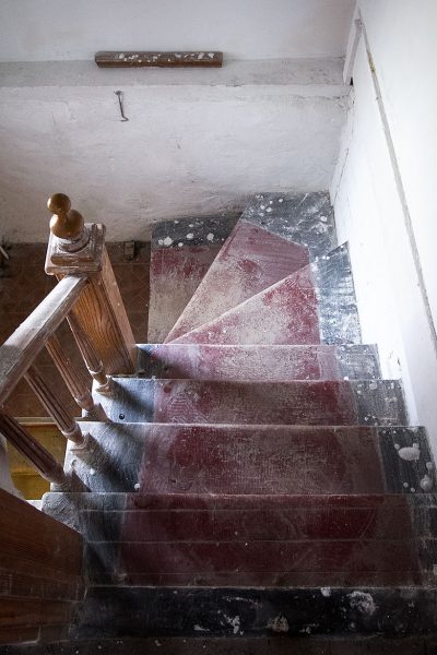 Stairs After Skim Coating Walls and Pulling Up Carpeting
