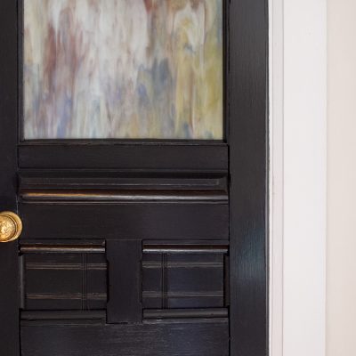 Painted Black Office Door with Brass Knobs | Making it Lovely