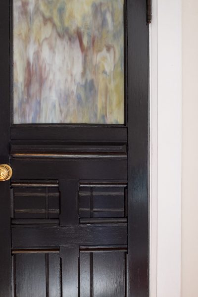 Painted Black Office Door with Brass Knobs | Making it Lovely