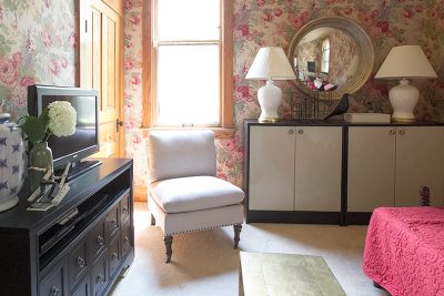 Storage Bookcases and Cabbage Rose Wallpaper