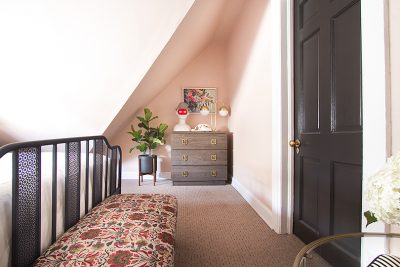 Looking Toward the Eaves, Pink Attic Guest Room