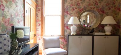 Storage Bookcases and Cabbage Rose Wallpaper