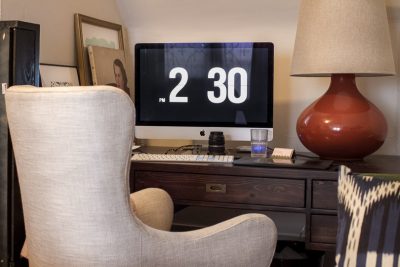 Wood Desk, Oversized Red Lamp, Upholstered Wingback Office Chair
