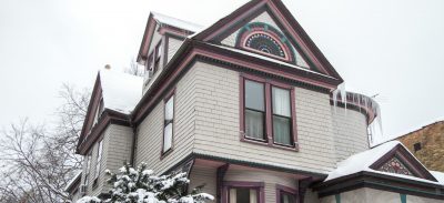 Our Victorian Queen Anne Home in the Winter with Icicles and Snow