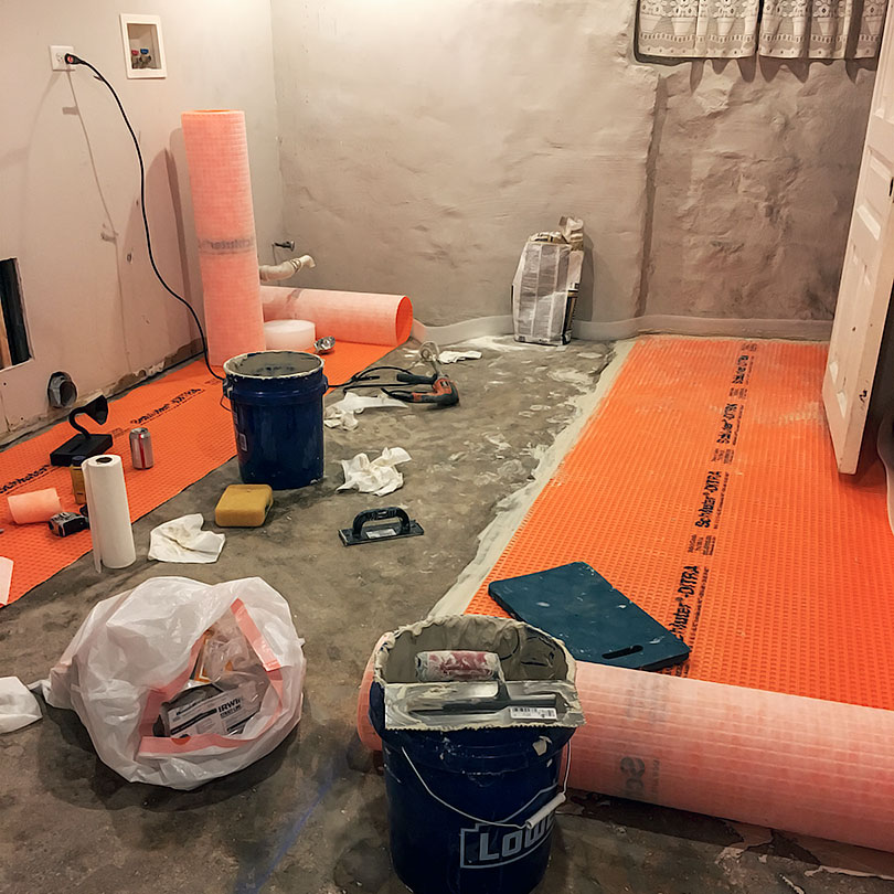 Laying Ditra to Prep for Tile