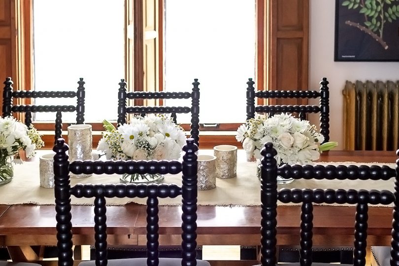 Dining Room Table with White Flowers