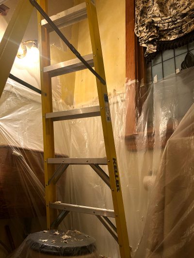 Stripping Wallpaper with a Plastic Drop Cloth Below | Making it Lovely