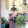 Swing Chair on a Victorian Front Porch | Making it Lovely