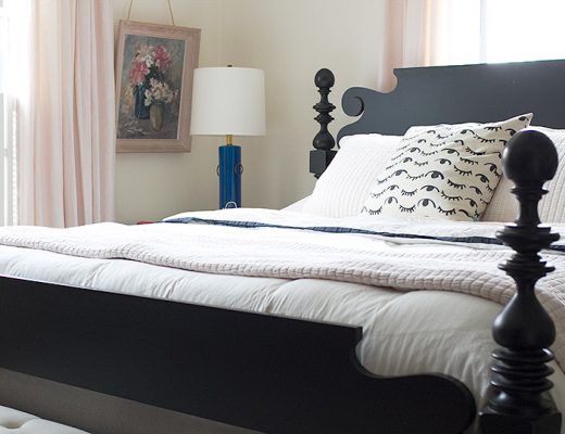 Black Wooden Bed, White and Pink Bedding